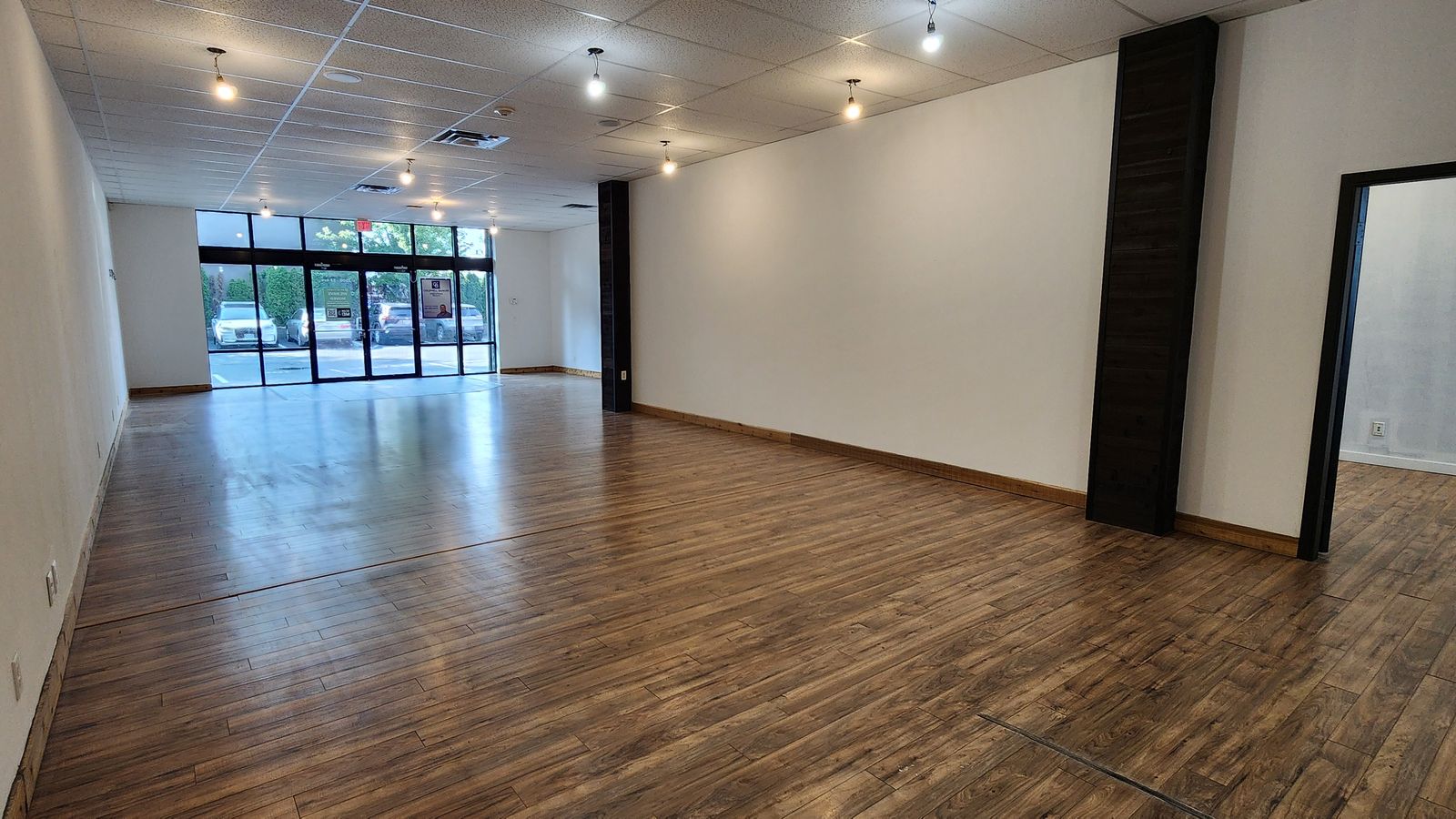 Bright open space with storefront glass and new flooring