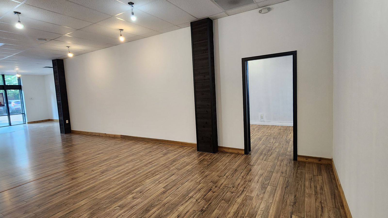 Interior showing the demising wall opening, which can be removed