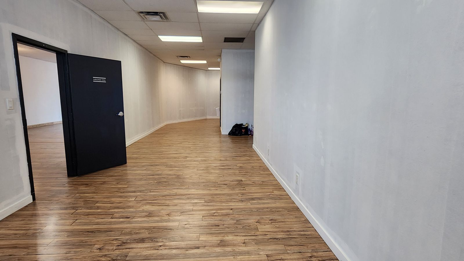 Hallway to the back rooms and storage
